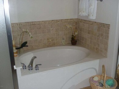 Master bath with tumbled Travertine