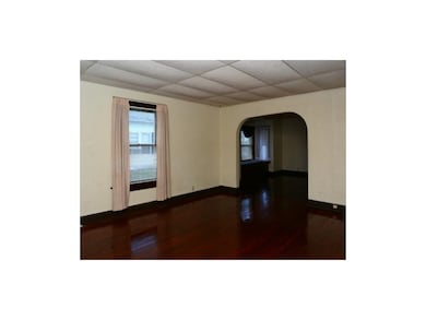 Arched passages throughout this quaint bungalow