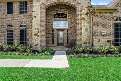 Charming front entry with a cozy porch and beautif
