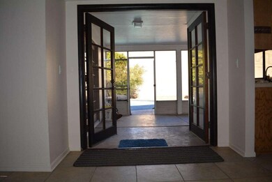 French doors from family room to AZ room
