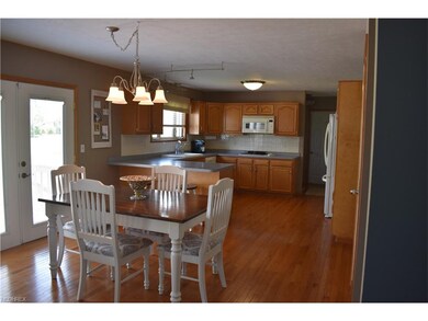 The eat-in kitchen is spacious and offers plenty o