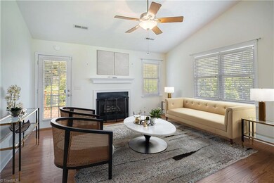 Living room with fireplace virtually staged.