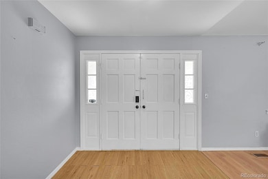 Double door entry leads you to the large foyer!