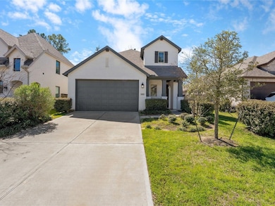 Charming curb appeal with extended driveway, and inviting front entrance