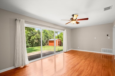 The spacious living room makes entertaining easy, with room for plenty of furniture or even a dining space