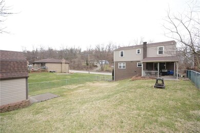 Large Backyard.  All Fenced.  This home is conveni