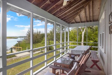 Sunroom with a healthy amount of sunlight and a wa