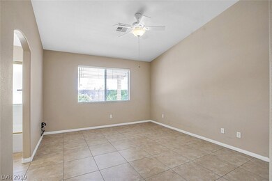 Master bedroom with vaulted ceiling, ceiling fan,