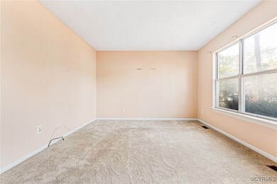 Family room with large windows for natural light