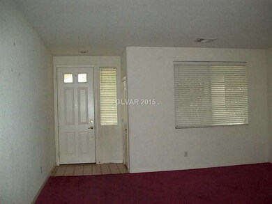 Property Photo. Front door into formal living/dini