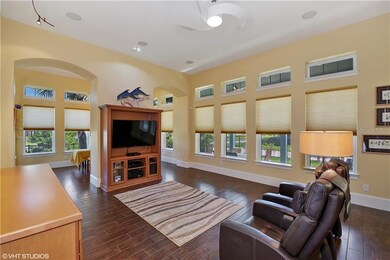 Family Room w/ Natural Light and Custom Transom Wi