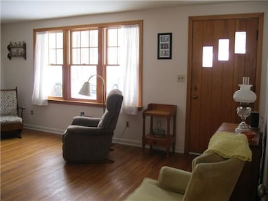 Living Room. Lovely hardwood floors throughout hou