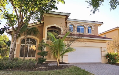Mediterranean / spanish-style house featuring driv