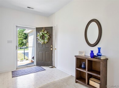 The foyer welcomes you to this light, bright, open