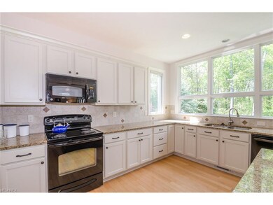 Bright and Light Kitchen, Hardwood Floor, Granite 