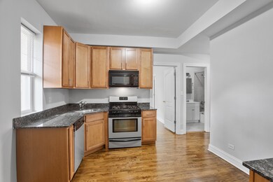 2009 W Jarvis Ave unit 3, Chicago, IL 60645 - photo 3
