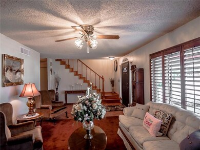 Formal living room with one of the three