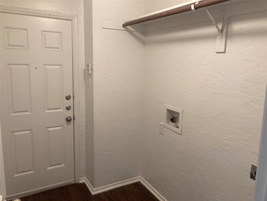 Washroom with hookup for a washing machine and dar