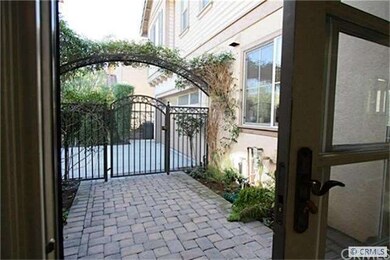 Charming Courtyard with Sliding French Doors