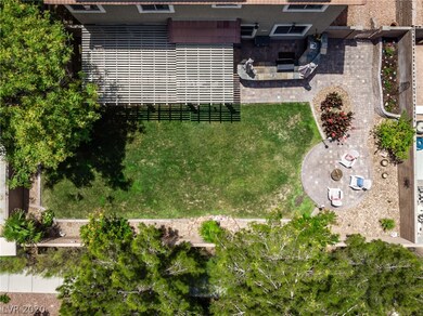 COVERED PATIO,  BUILT IN OUTDOOR KITCHEN,   PAVERS