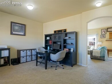 Formal living room flows into the living/dining ar