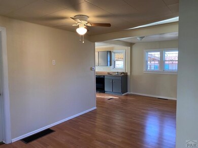 view from entryway looking into kitchen
