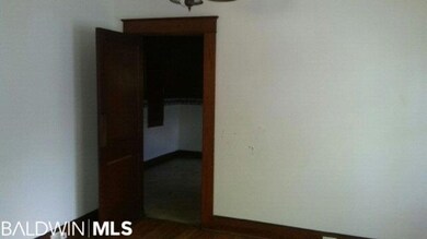 Dining room going into kitchen, original swing doo