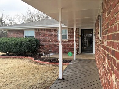 Front Entrance with wood deck walkway.