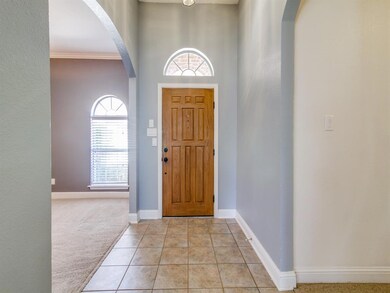 Entry - shows formal dining area to left.