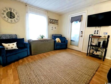 Living Room - Sofa, 2 sleeper chairs, TV, game cabinet