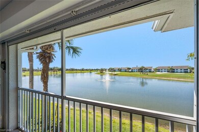 Sunroom with a water view and ceiling fan