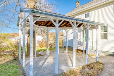 Rear covered patio perfect for grilling and entert