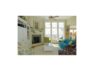Fireplace in great room ties to built-in storage a