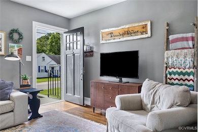 Living room featuring hardwood flooring