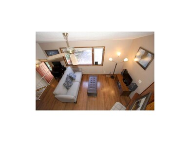 GREAT ROOM, SHOT FROM UPSTAIRS LOFT ROOM.