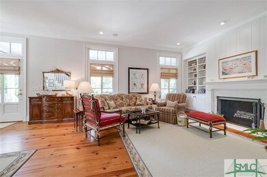 Living room with wood burning fireplace, gas start