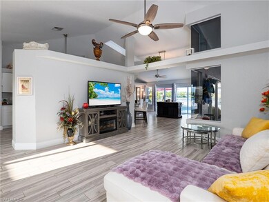Living room featuring light hardwood / wood-style 