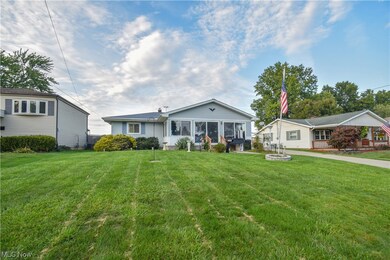 Front of house featuring a lawn