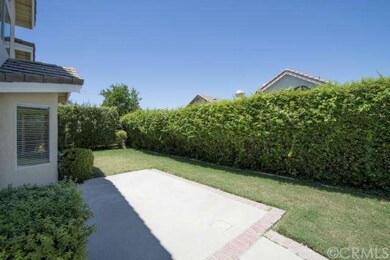Private backyard with patio.