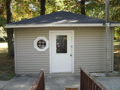 7688 N Woodbridge Rd, White Cloud, MI 49349 - photo 5