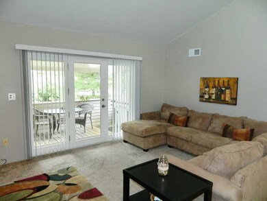 Living Room. Access to covered deck.