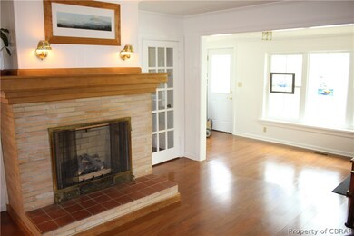 Living room w/gas fireplace Entry door