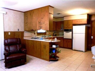Open Kitchen & Den Areas
