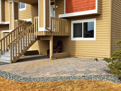 Brick patio in front yard