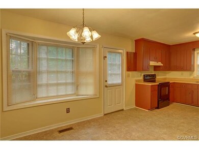 Eat In Kitchen with Bay Window and Deck Access