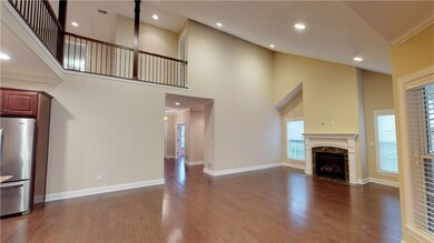 The open balcony is a dramatic accent to this spac
