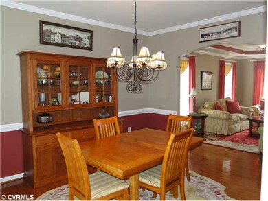 Dining Room - Formal Dining Room With Wood Floors,