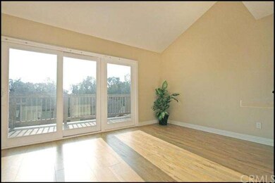 Sliding glass doors lead to large deck with awesom
