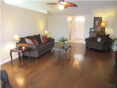 View of the foyer from the fireplace. Office to the left of foyer, living room to your right.