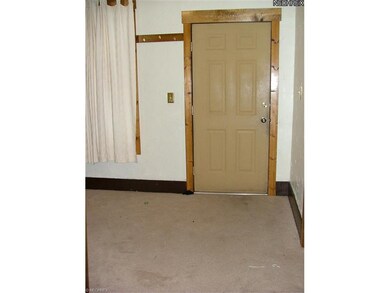 Steel entry door off porch to front foyer